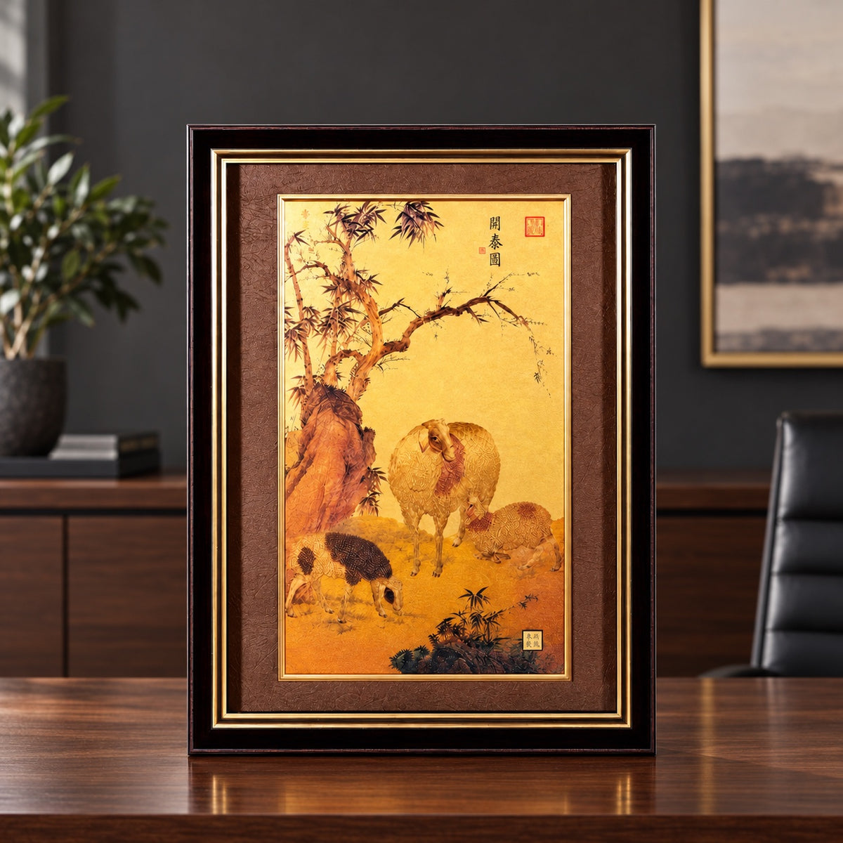 Three Rams framed artwork shown on a walnut office desk.