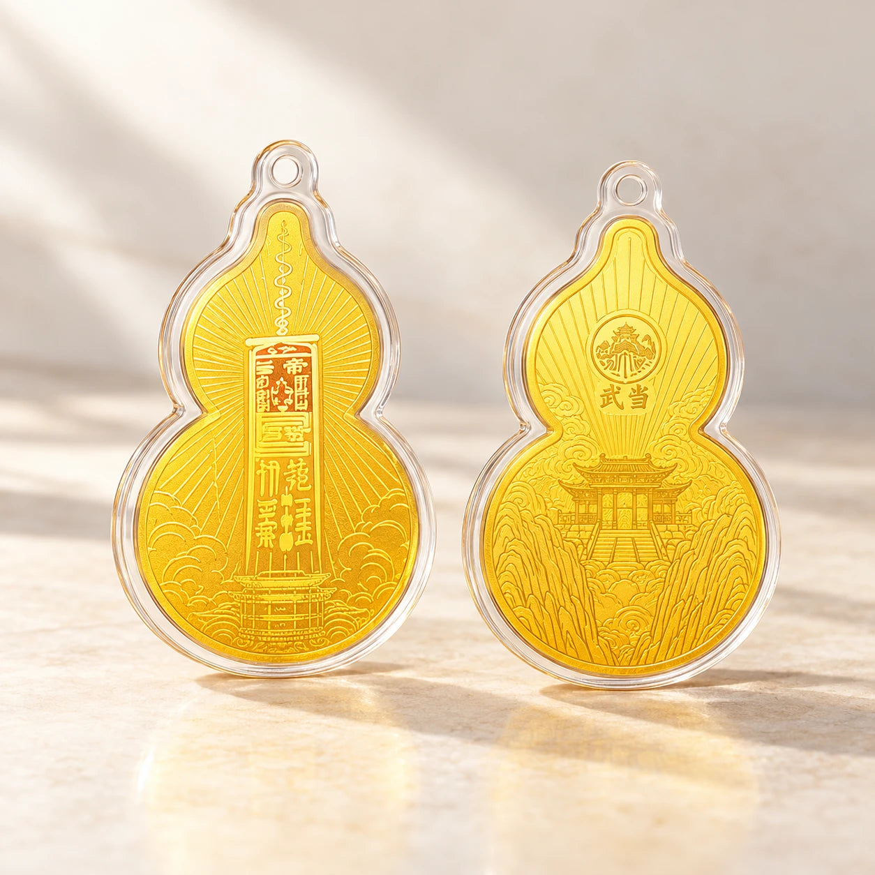 The Wudang Wenchang gourd charm showing the original gold-toned surface decoration and clear outline